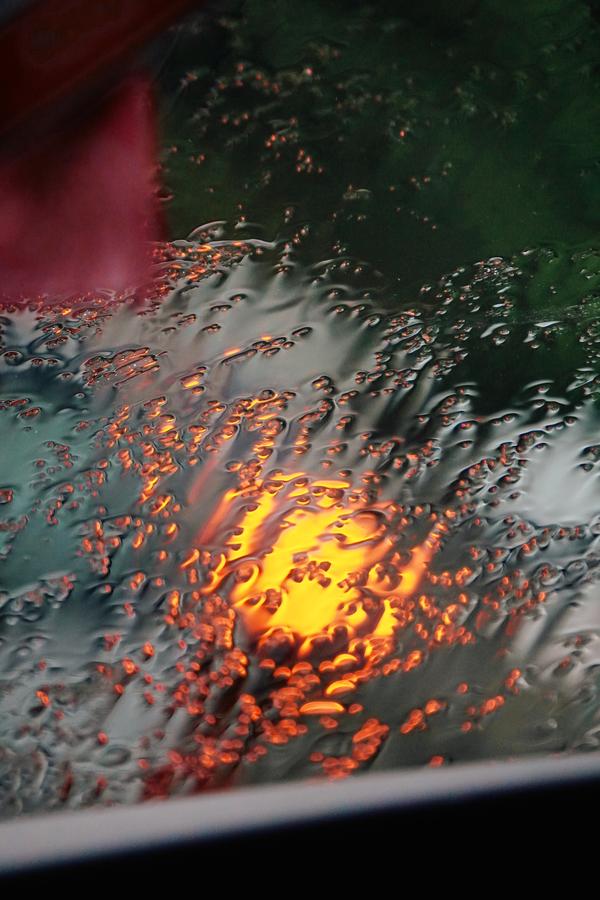 Sunset through a wet window